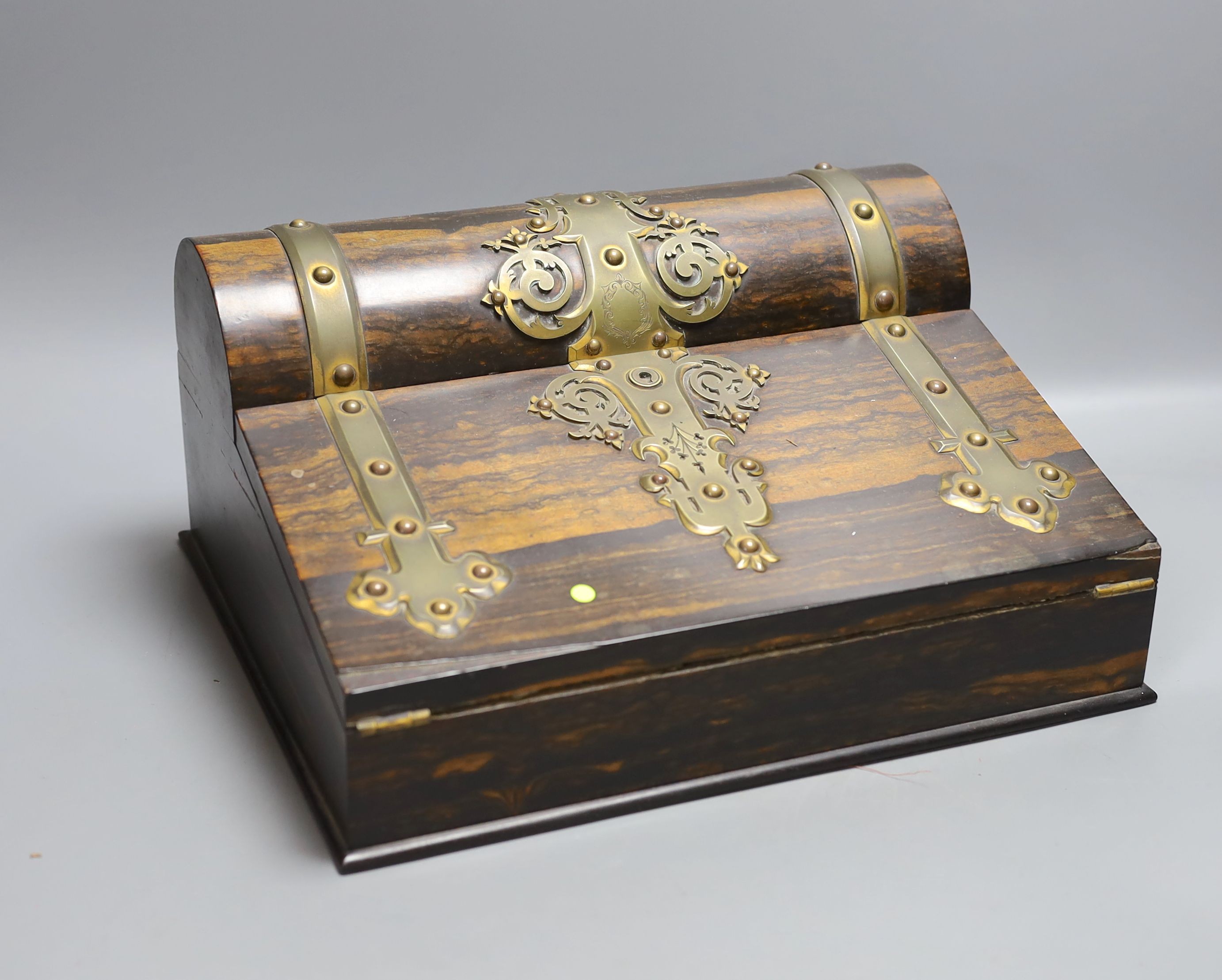 A Victorian coromandel stationery box with brass mounts, 32 cms wide.